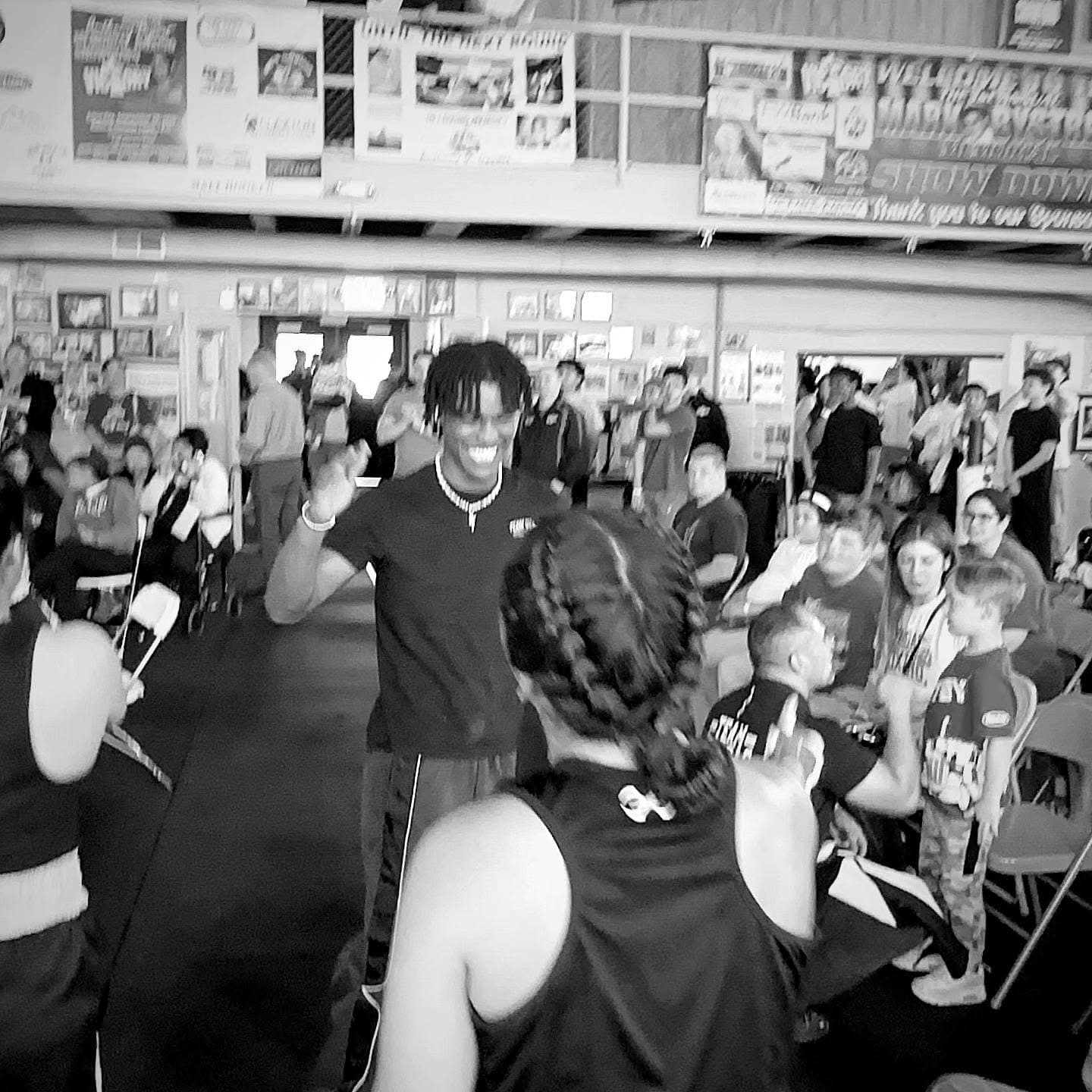 A Vargas fighter celebrating with the team at the gym