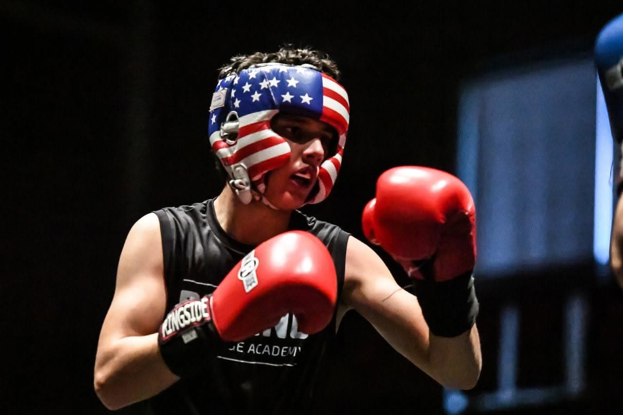 A Vargas boxer in USA-flag headgear with his guard up