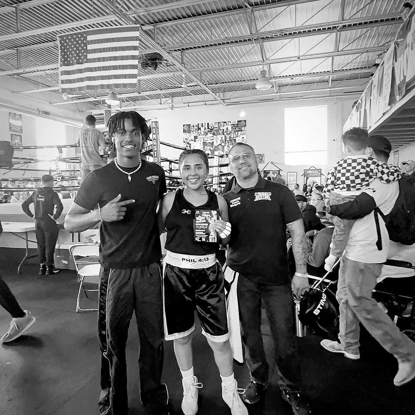 A Vargas fighter with the coaches at a tournament